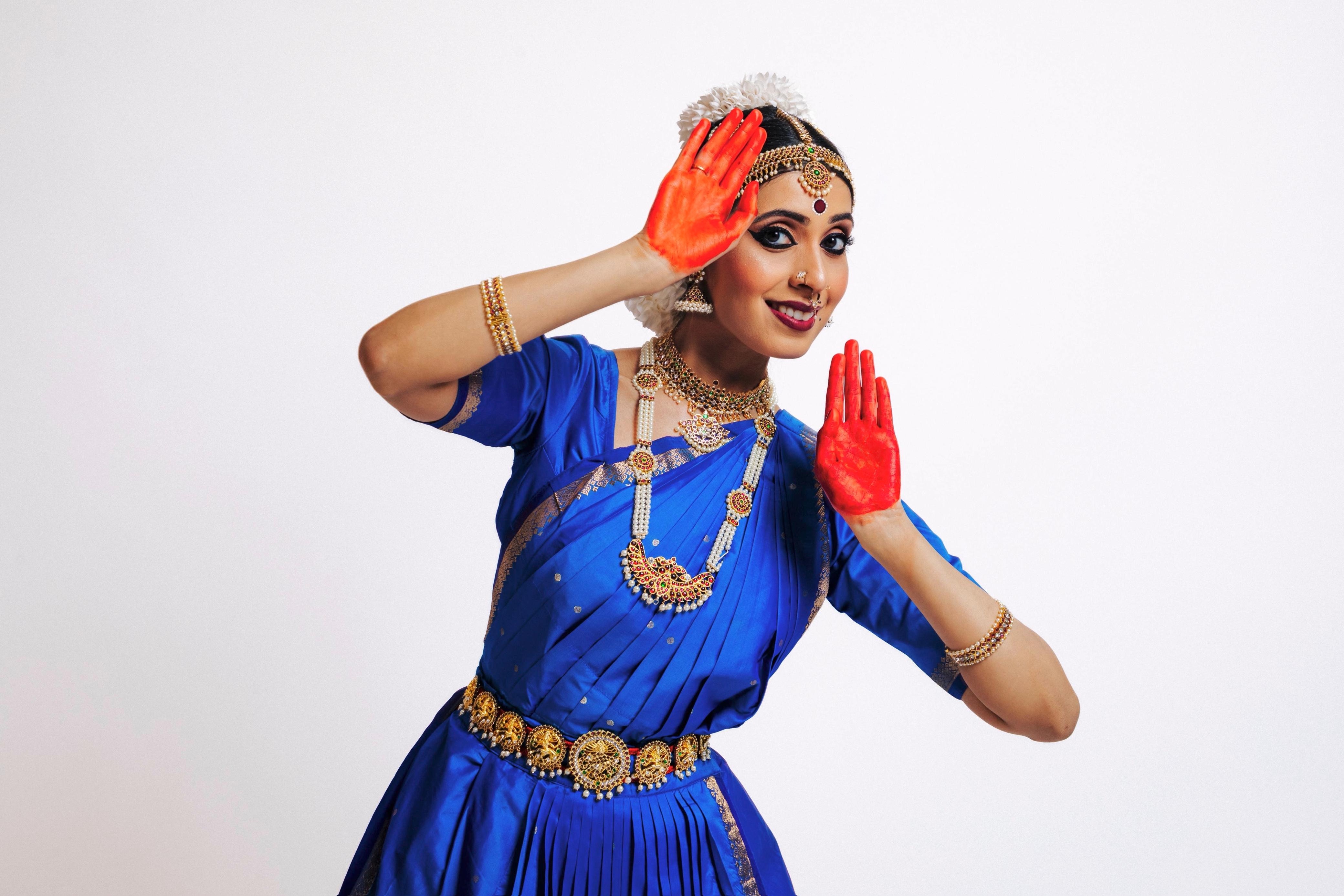 Madhumanti Banerjee classical dance expression in blue attire
